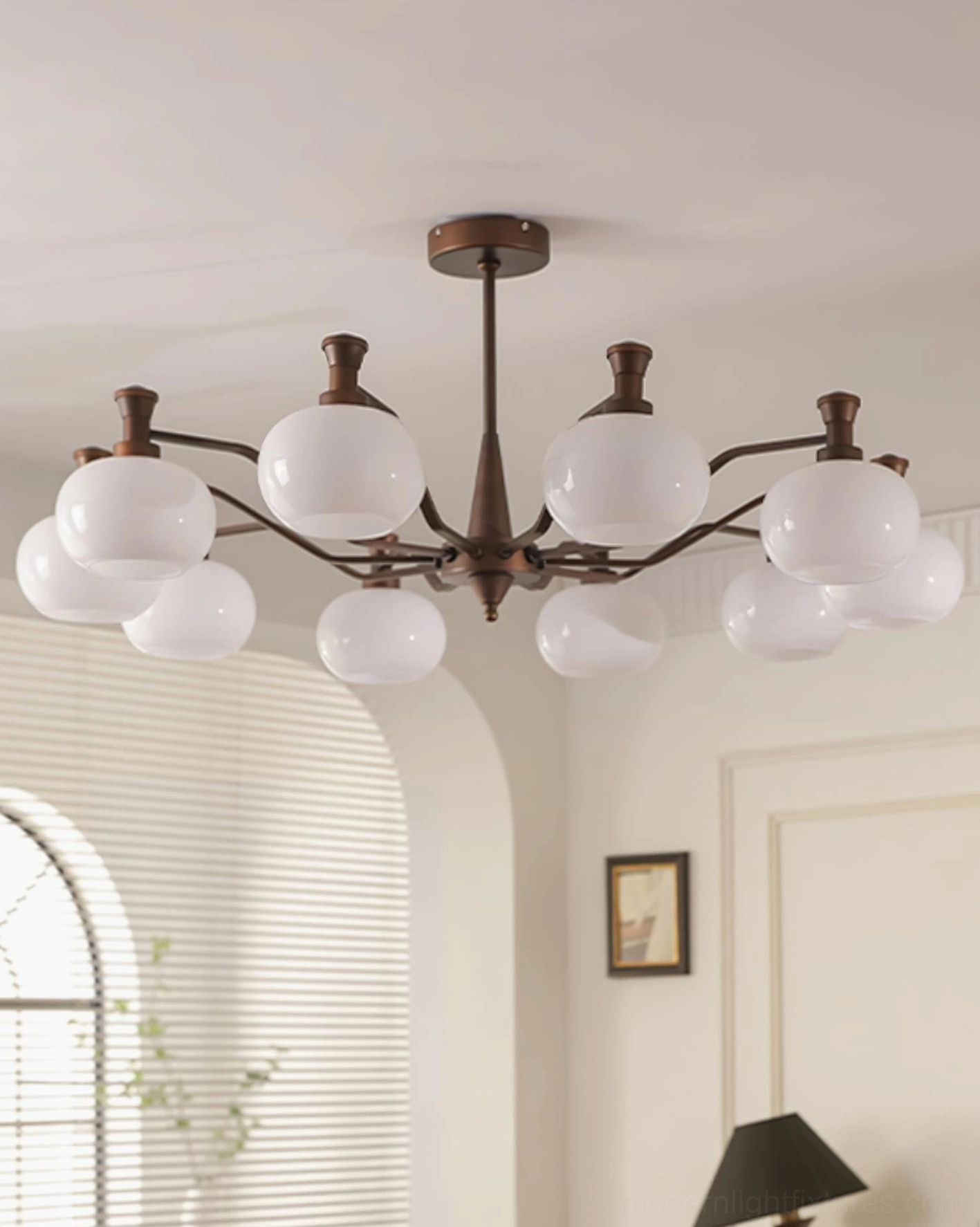 Cassia 10-head modern retro chandelier in French-style bedroom with arched window and white glass shades