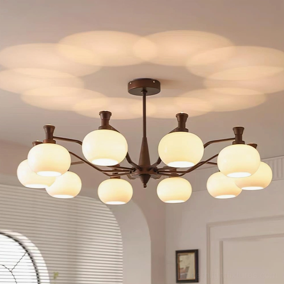 Cassia 10-head statement chandelier in luxury living room with high ceilings and dramatic lighting effect