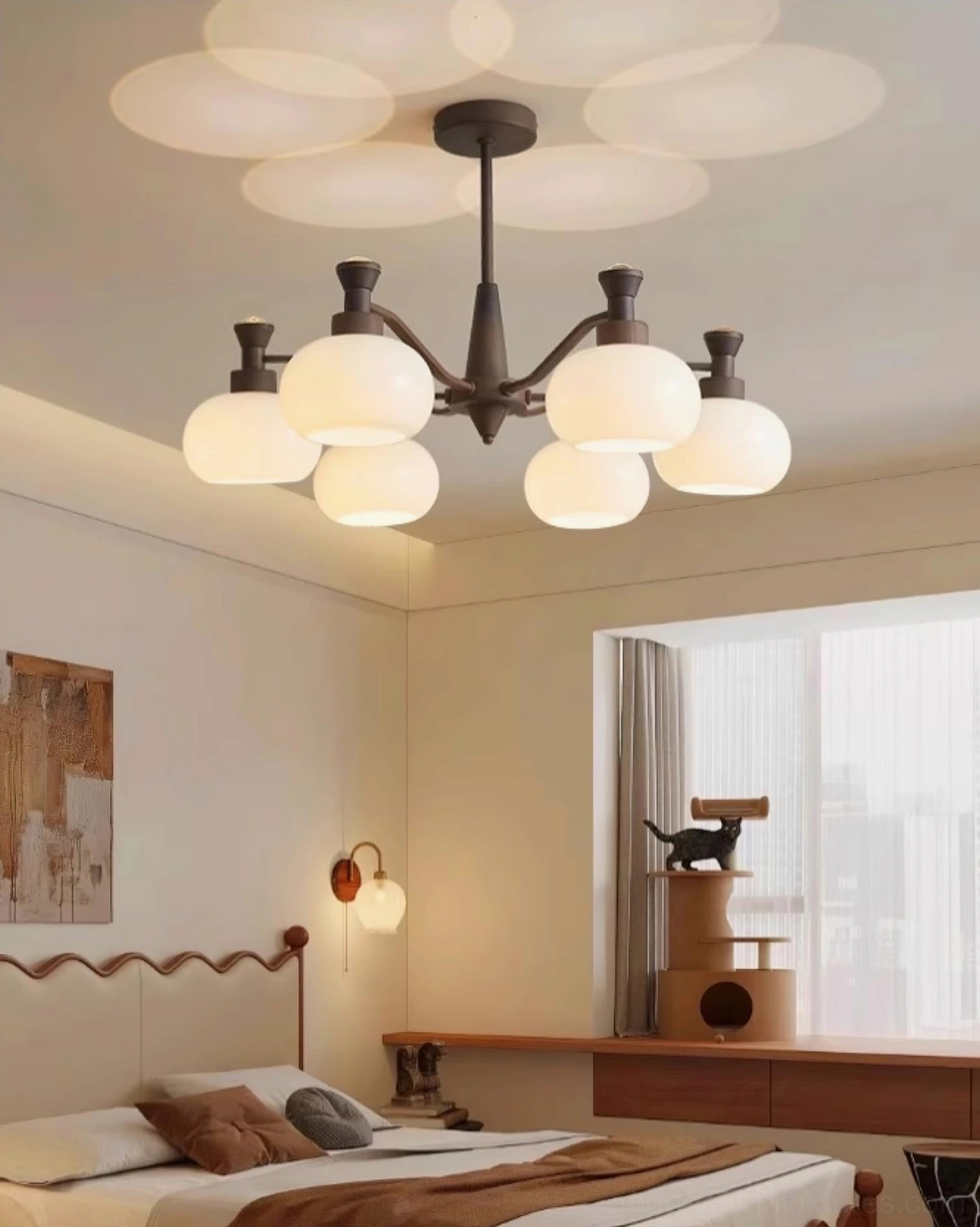 Cassia modern chandelier with curved arms and frosted opal glass globes, architectural ceiling detail view