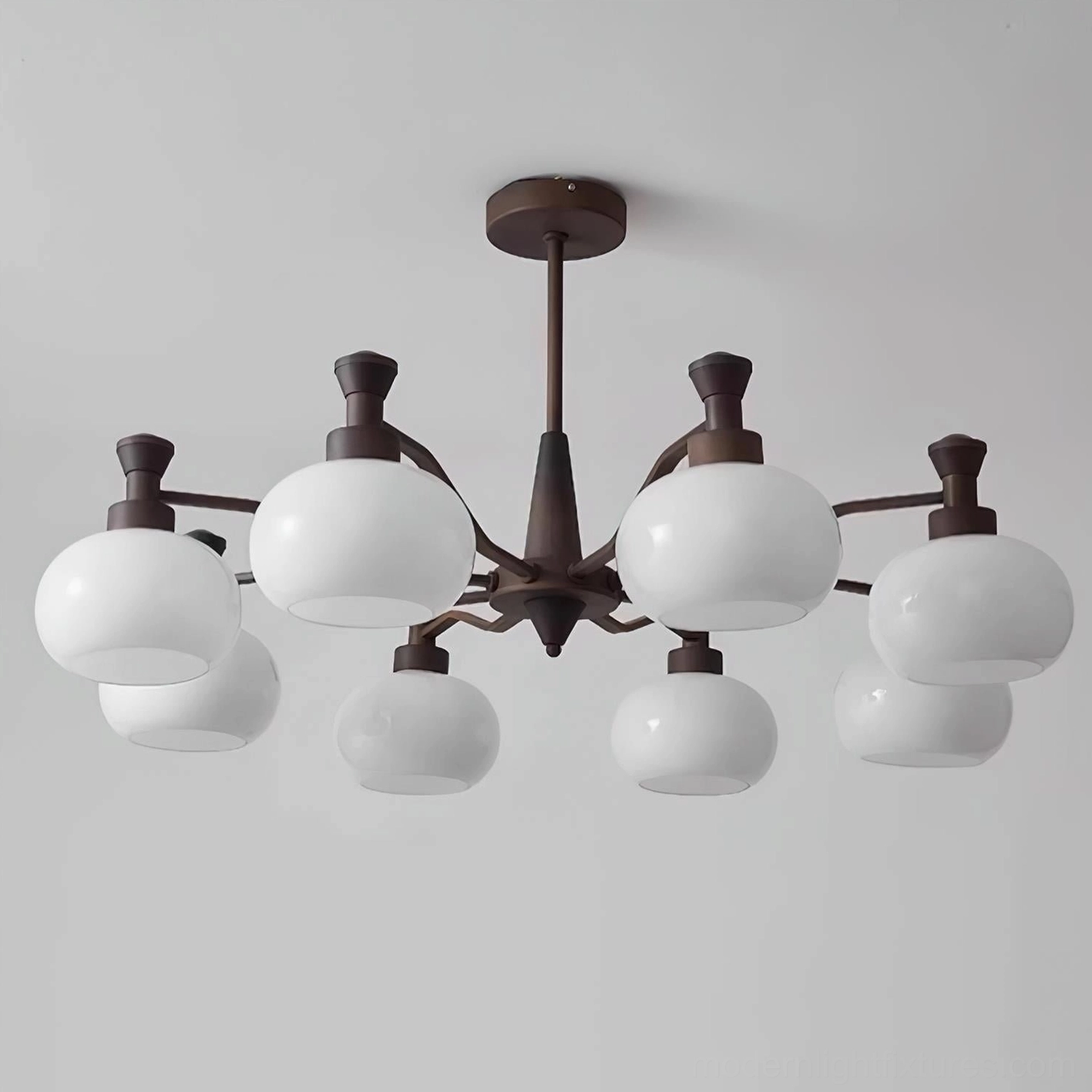 Cassia chandelier installation showing proper hanging height and light distribution in foyer space