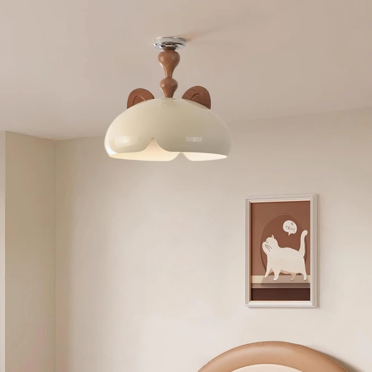 Side overhead view of modern cat ear ceiling light showing smooth glossy cream shade and warm illumination