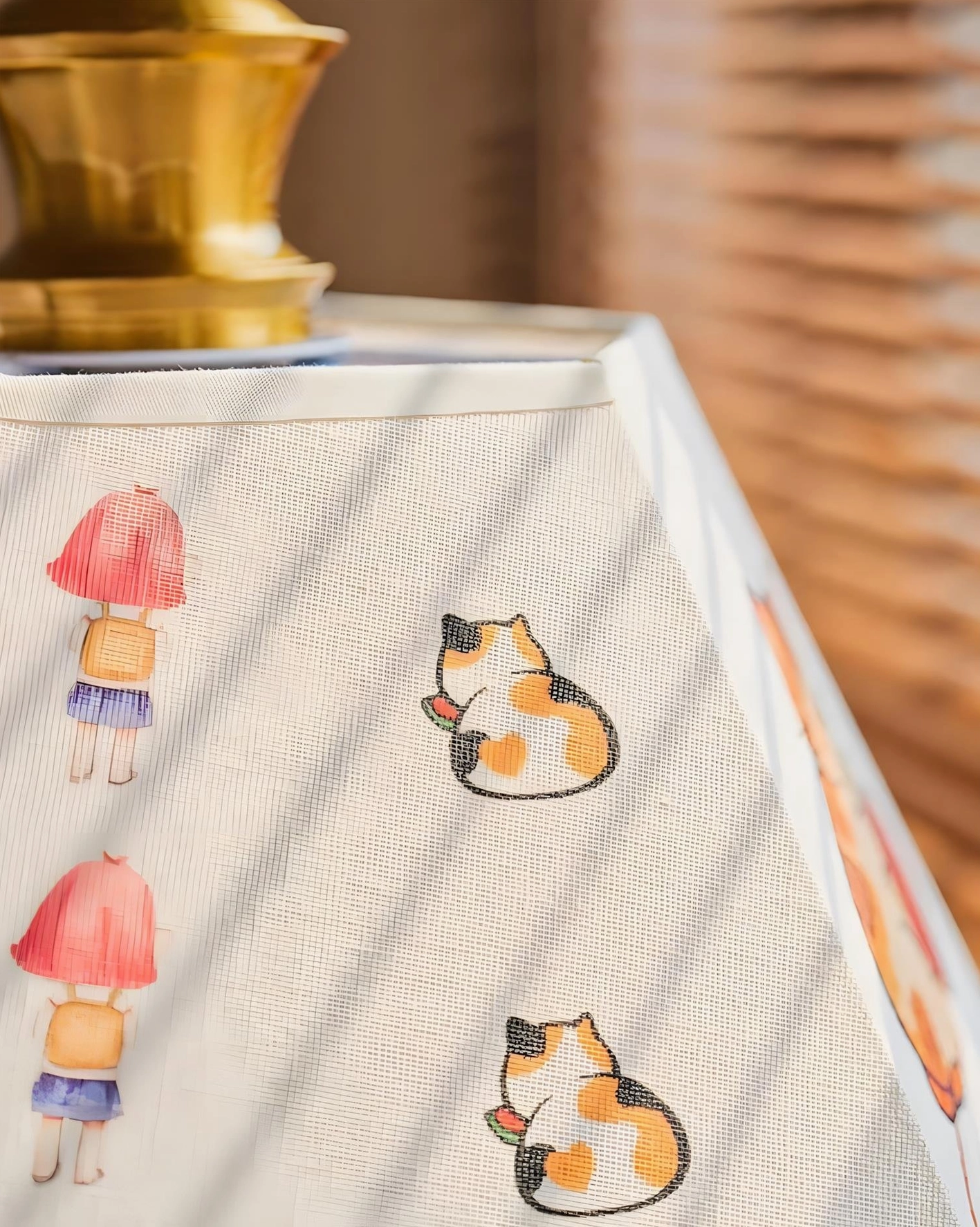Playful cat illustrated pendant light with geometric hexagonal shade and vintage brass elements
