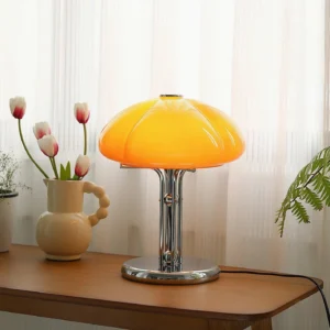 Cato mid-century modern table lamp in burnt orange glass - three-quarter angle view showing ribbed texture