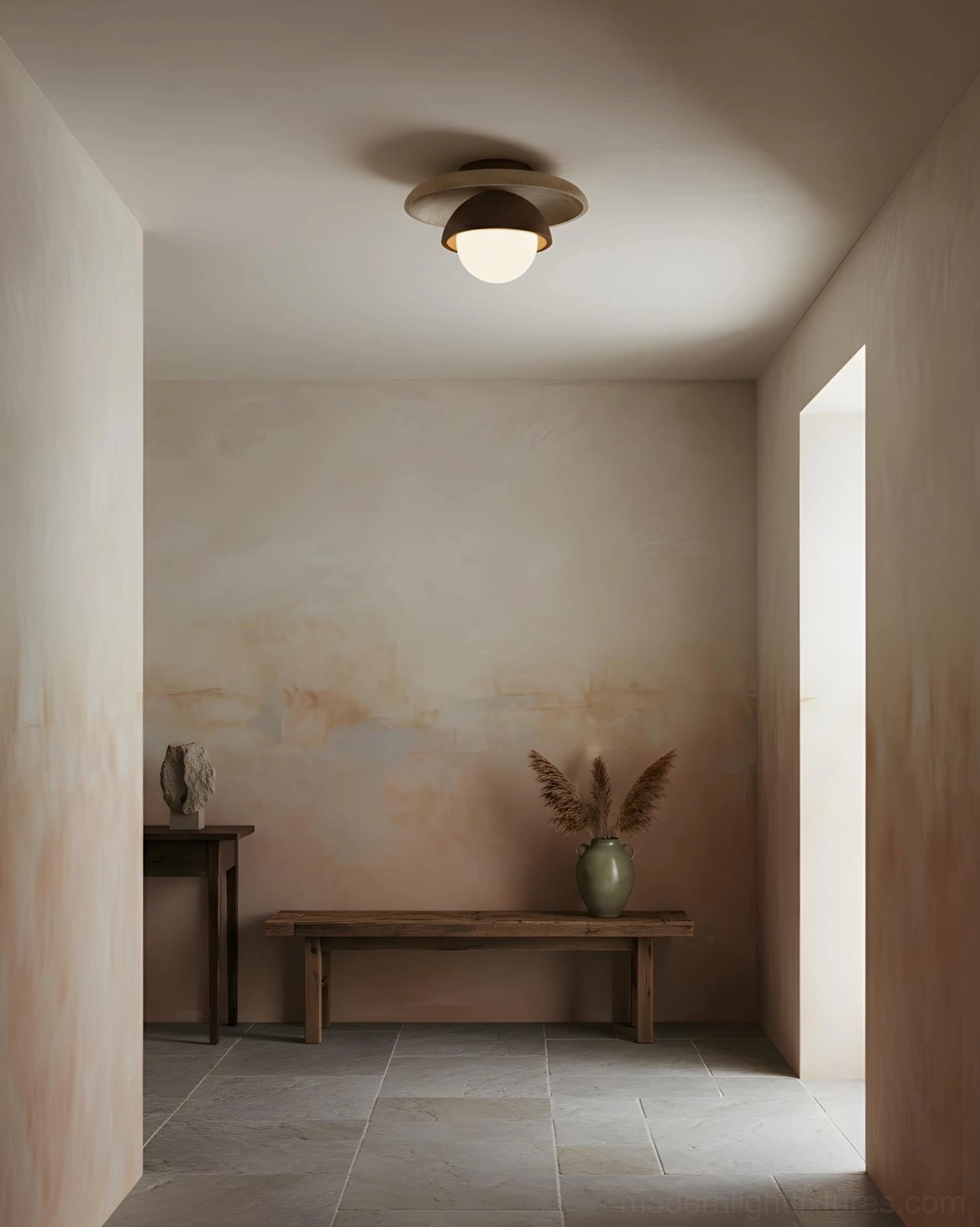 Cavara minimalist ceiling light in minimalist hallway entryway, creating soft halo effect, neutral rustic interior