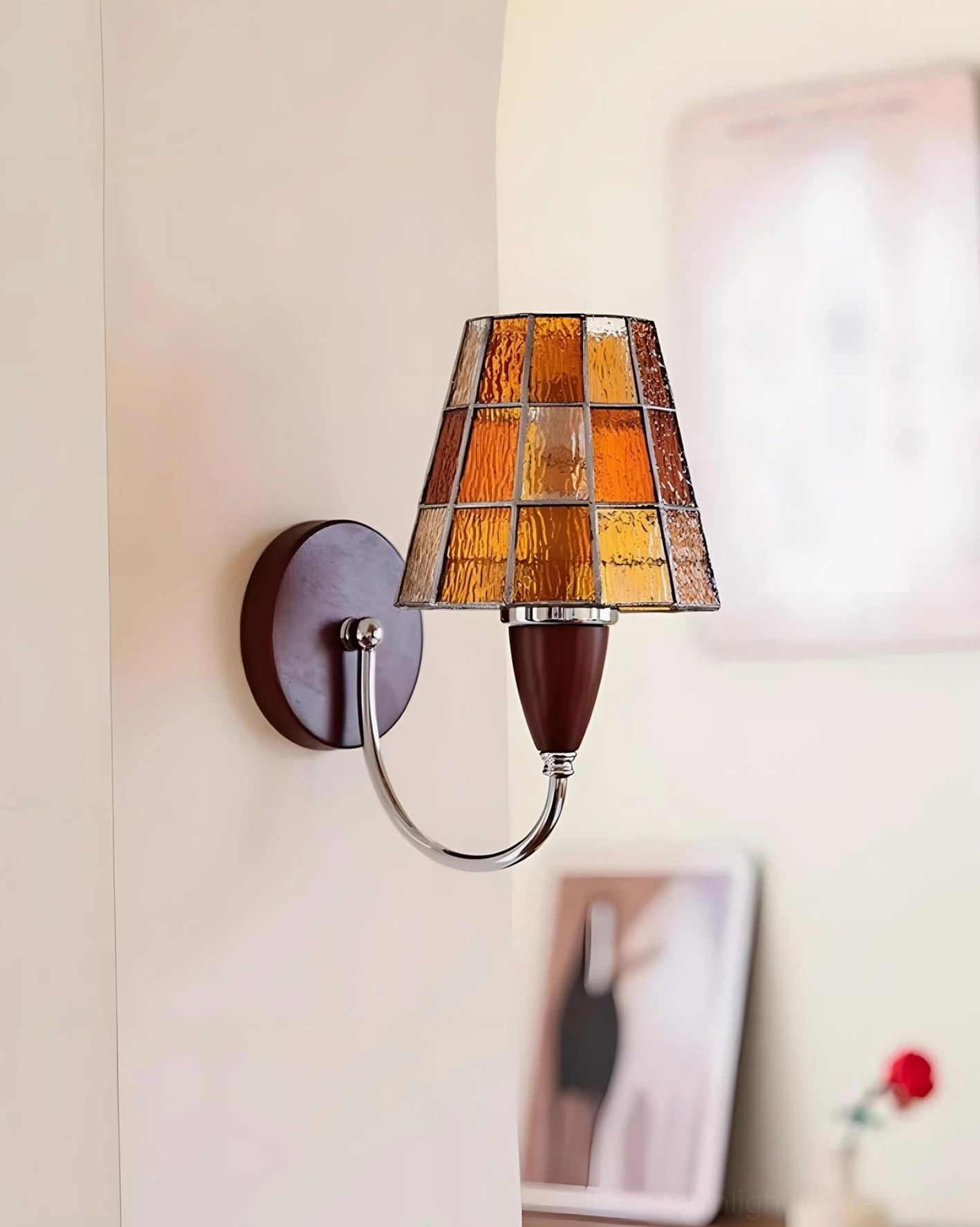 Cavero wall sconce installed in contemporary interior space with clean white walls and modern furnishings