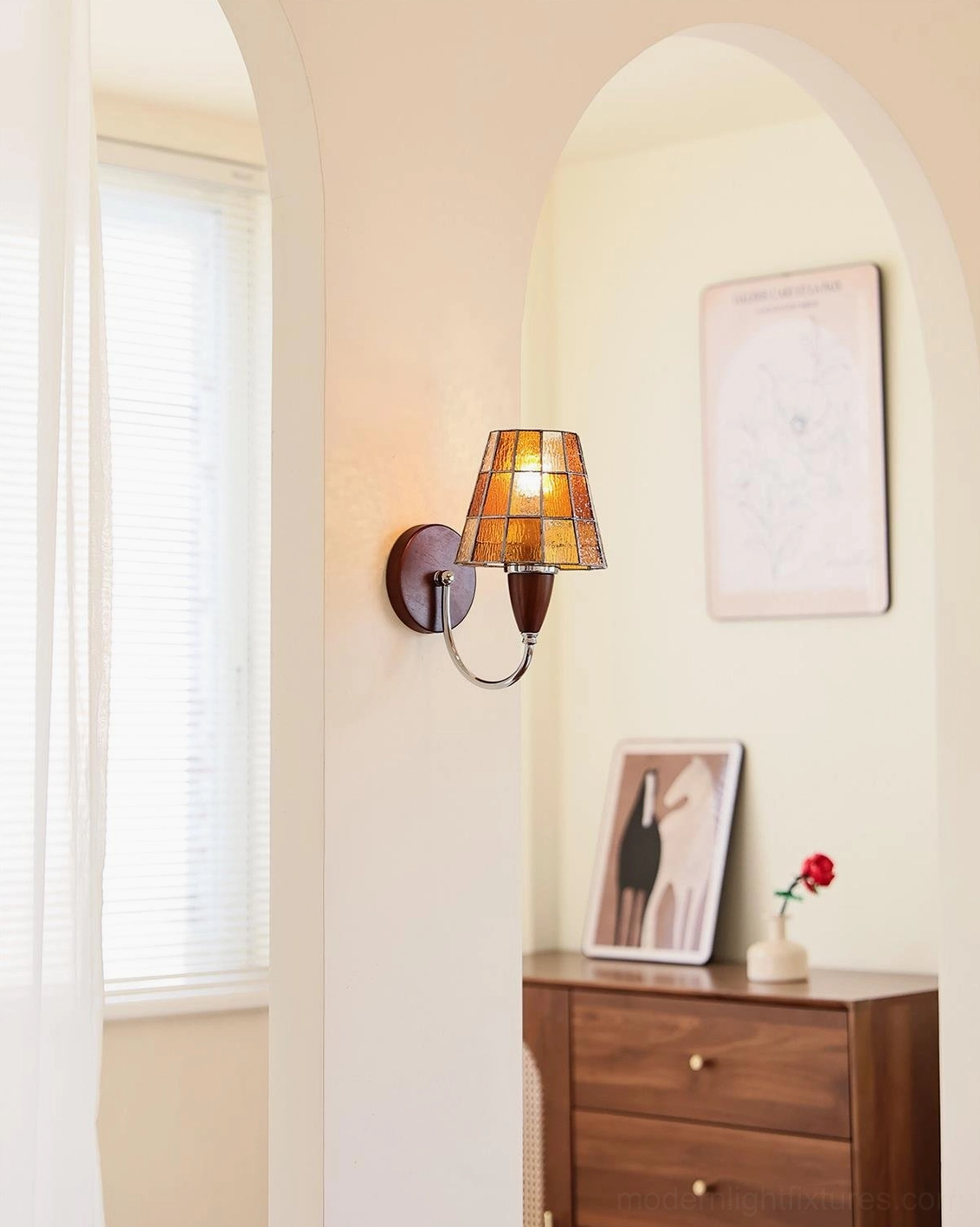 Cavero wall sconce detail showing wood accent materials and refined craftsmanship of metal body