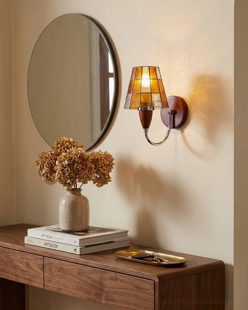 Cavero sconce above vanity console table with mirror and dried flowers in transitional home decor style