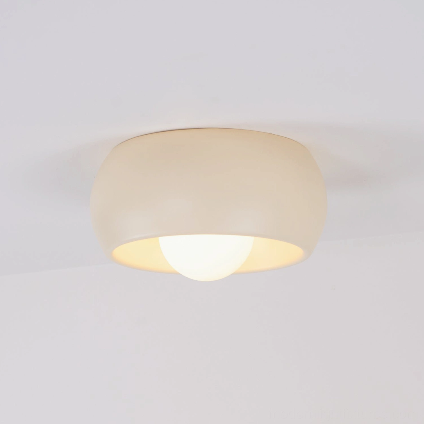 Beige finish ceiling light option in warm residential setting demonstrating color harmony