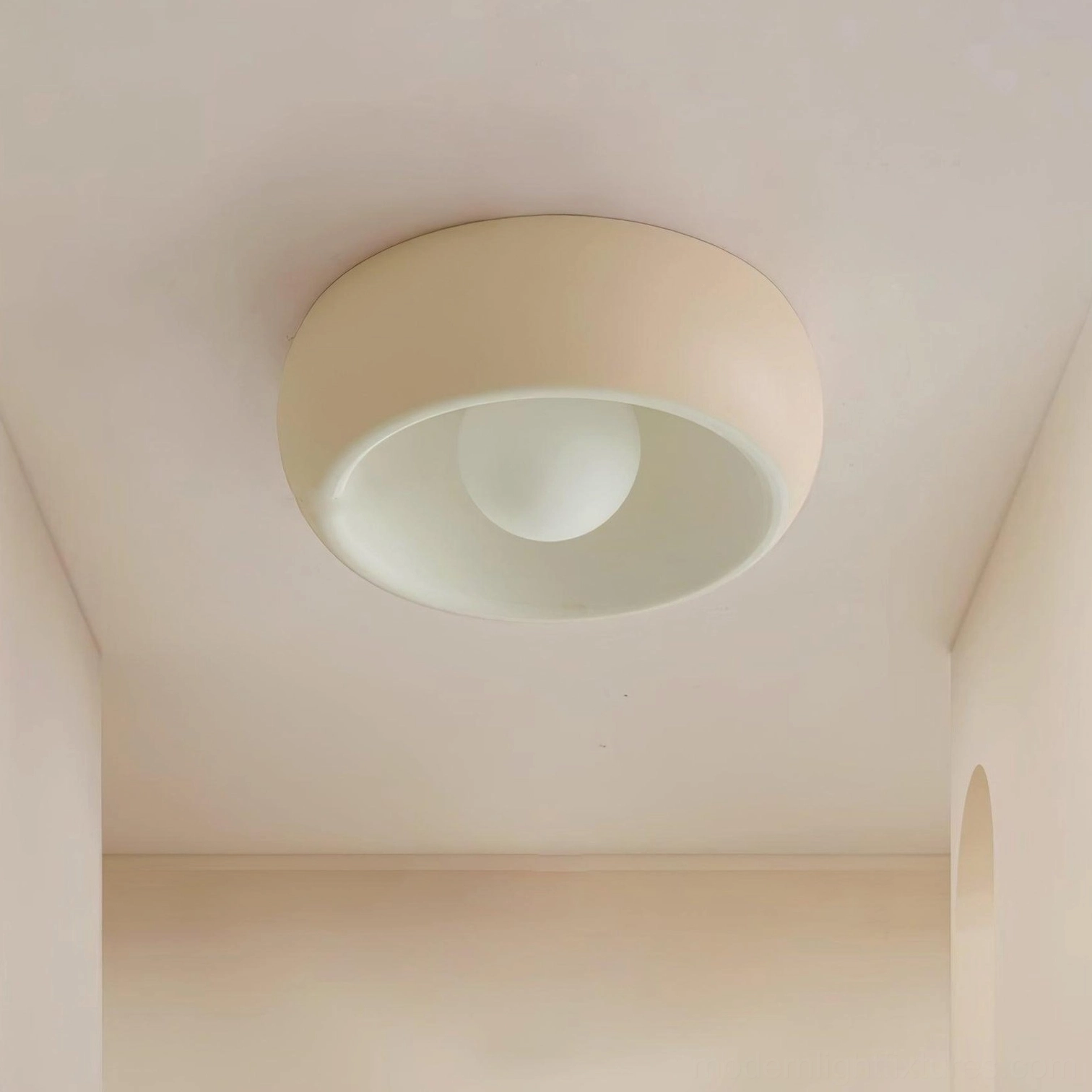 Modern circular flush mount ceiling light showing form-follows-function contemporary design philosophy