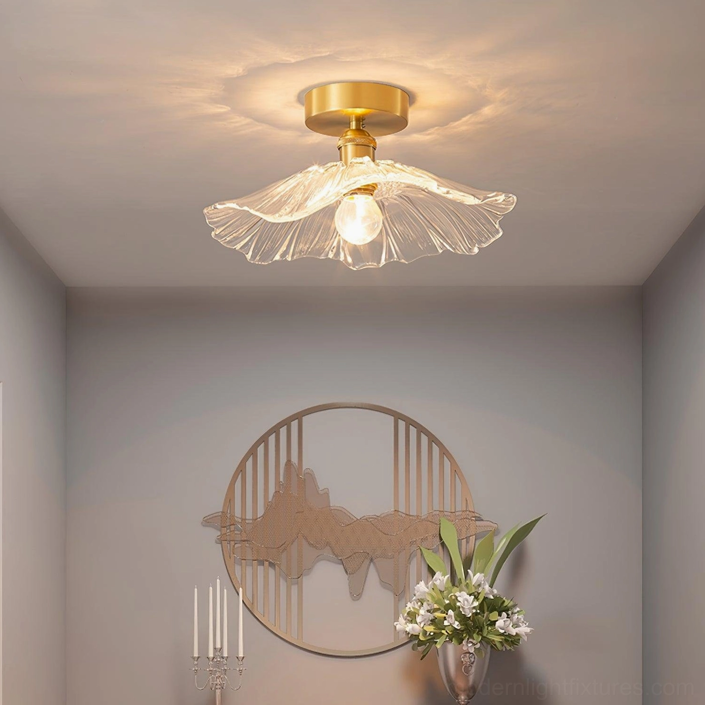 Ruffled glass semi-flush ceiling light mounted in accent wall hallway with brass finish coordinating with mountain-themed decor