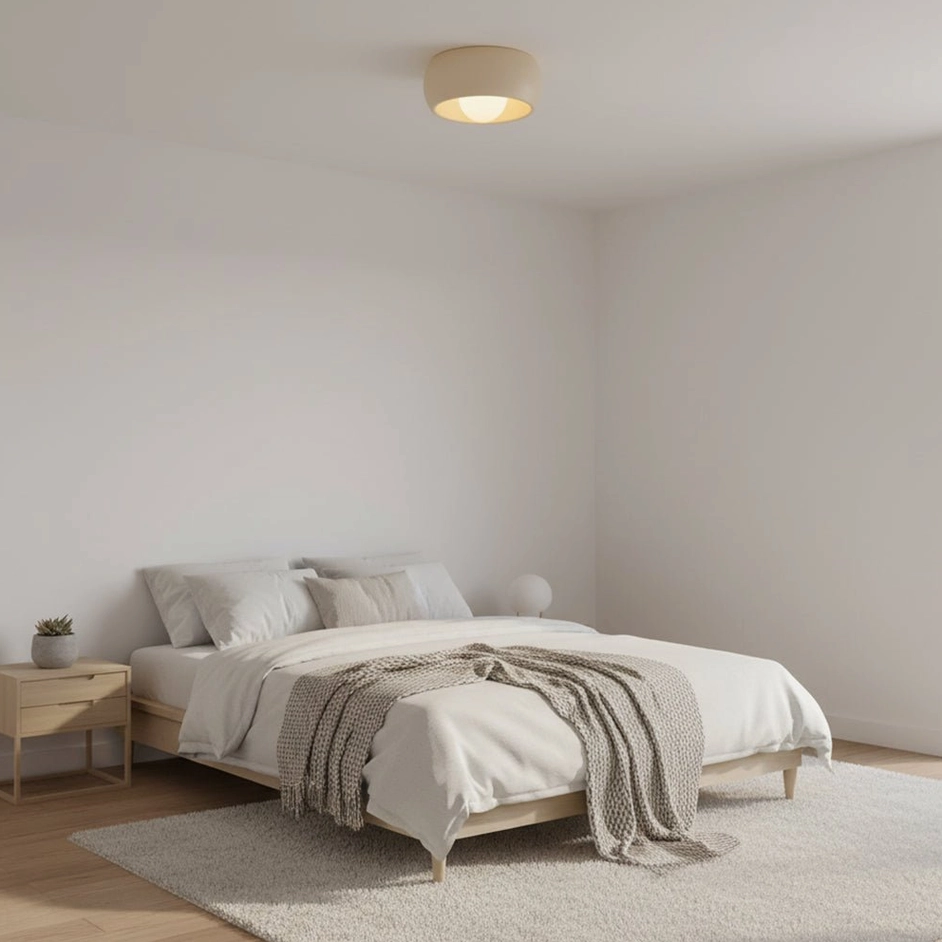 Clean geometric circular design of modern ceiling fixture against neutral background