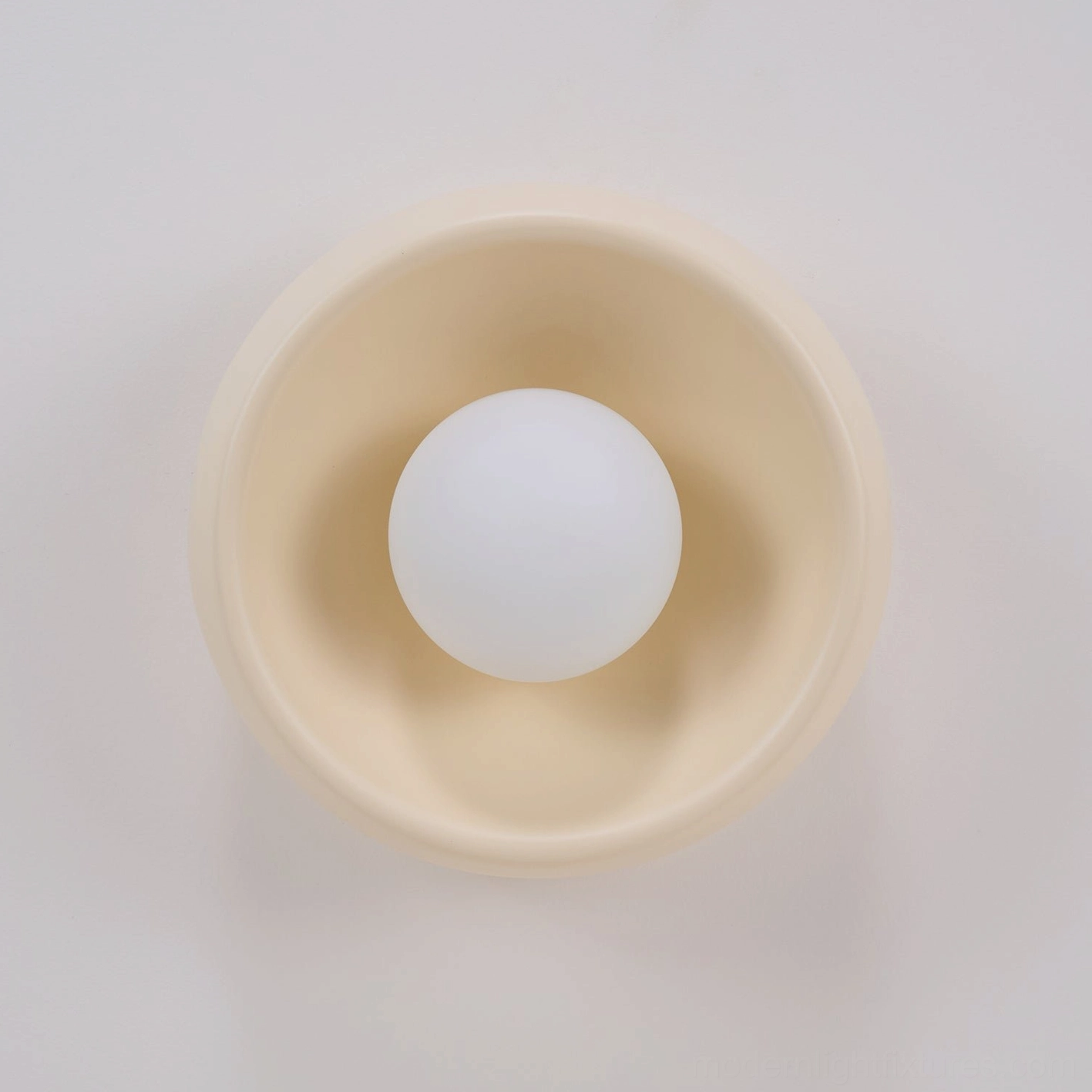 Modern circular ceiling light with perfect geometric symmetry providing visual design balance