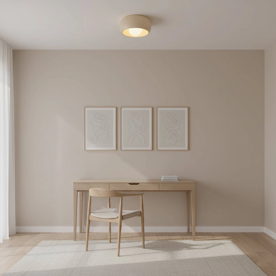 Home office study space with neutral ceiling light fixture integrated into minimalist workspace design