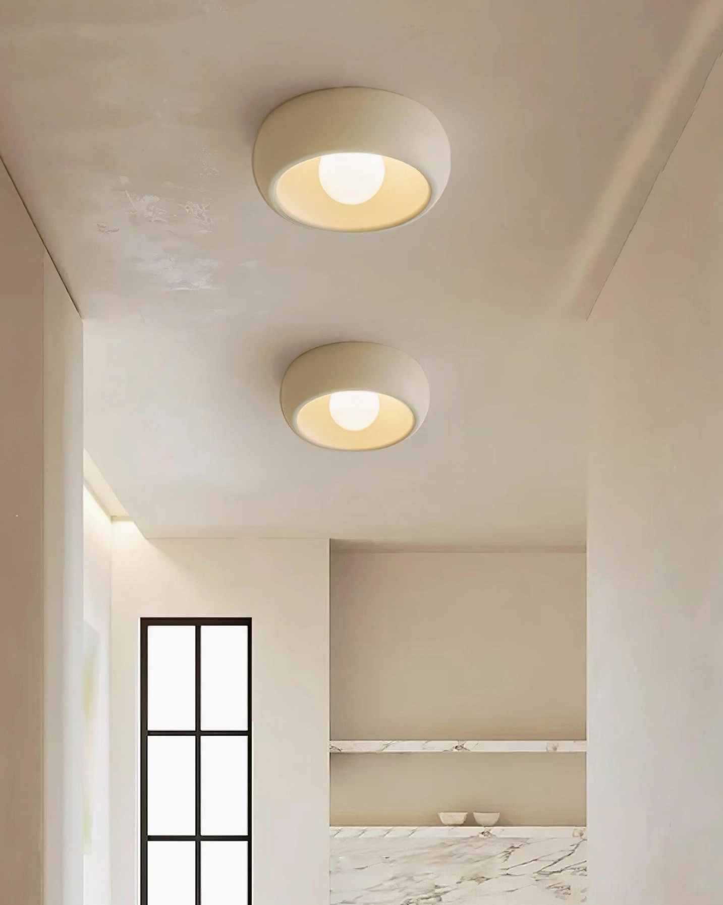 Ceiling light fixture installed above kitchen counter workspace showing task lighting application