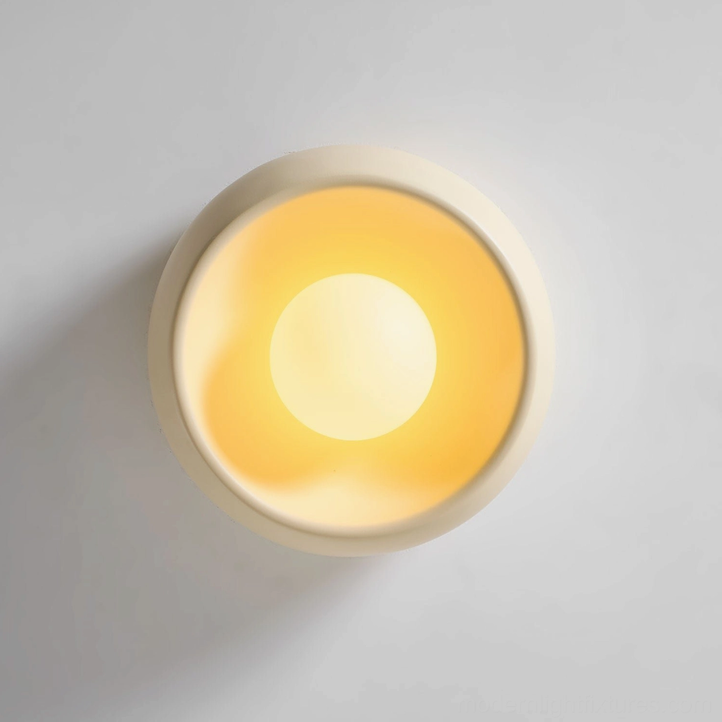 Circular flush ceiling light demonstrating clean form without trendy details for lasting design value