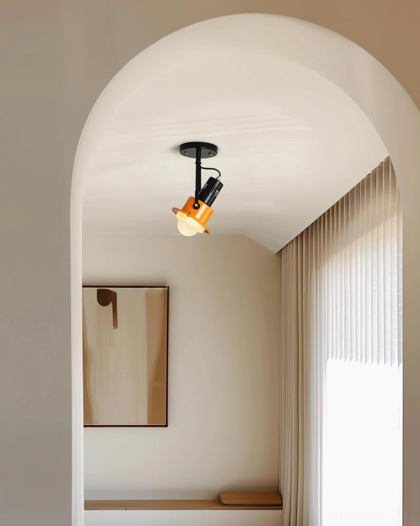 Modern adjustable ceiling spotlight installed in minimalist home hallway, warm ambient lighting effect
