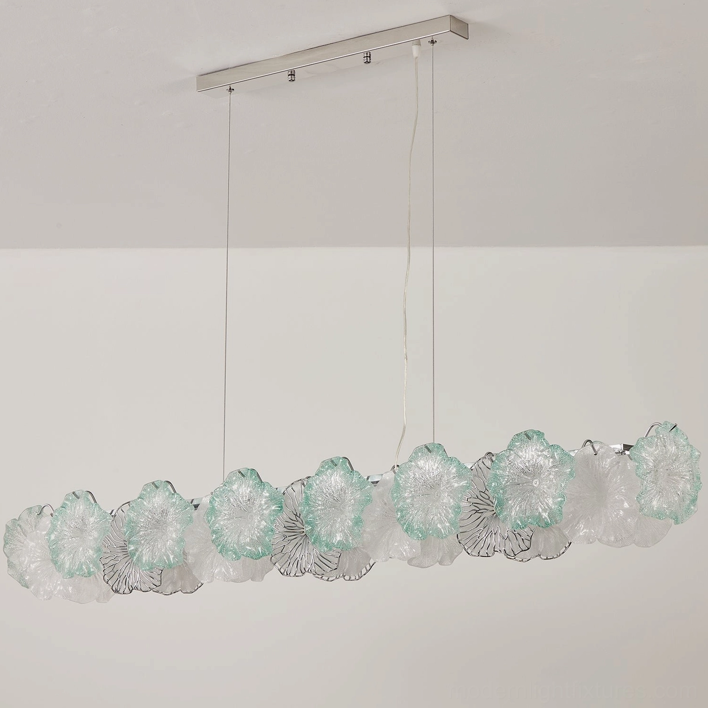 Celadine blush pink chandelier unlit showing sculptural form of hand-formed glass petals and polished chrome structure