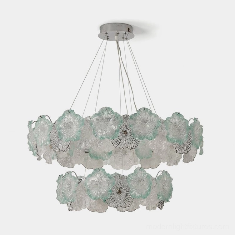 Celadine double-tiered floral glass chandelier with hand-formed seafoam green and clear glass petals, polished chrome frame, and clear cable suspension—studio shot with white background
