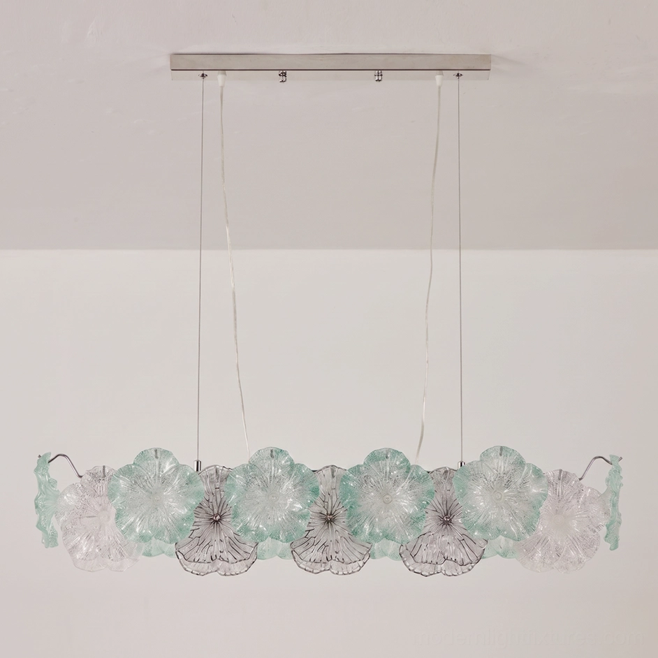 Celadine linear bar chandelier with seafoam green and clear hand-formed glass petals showing elongated shape for long tables