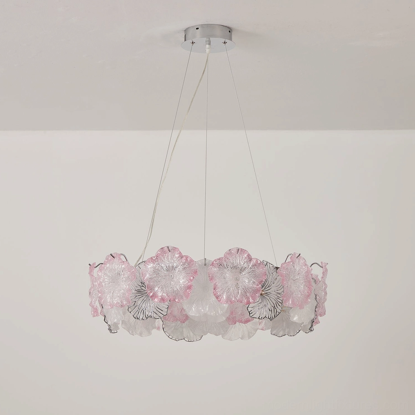 Celadine round single-tier chandelier with seafoam green and clear hand-formed blossoms, seven-foot floor clearance in dining space