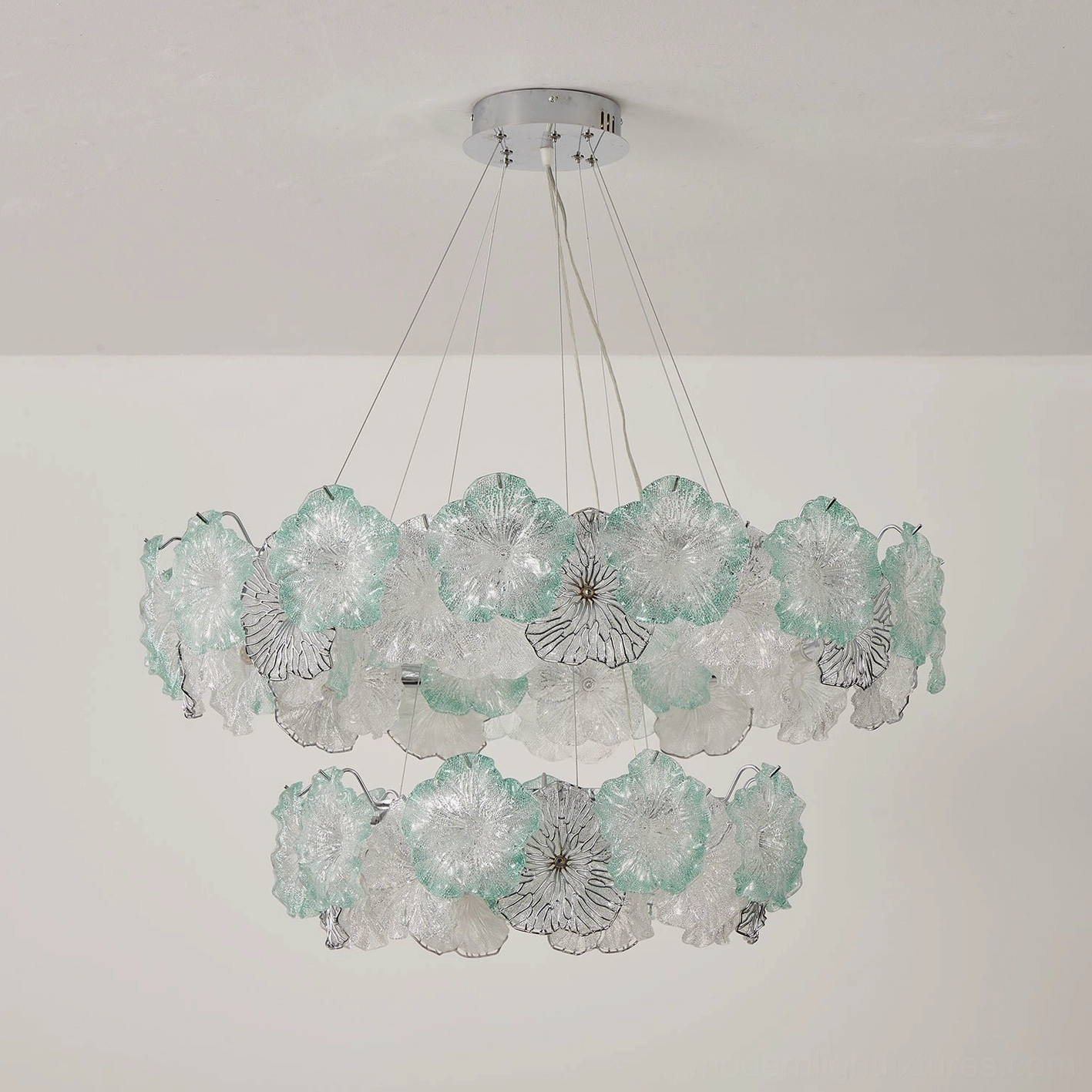 Celadine round two-tier chandelier with hand-formed glass petals in mixed seafoam green and clear showing dimensional stacked structure