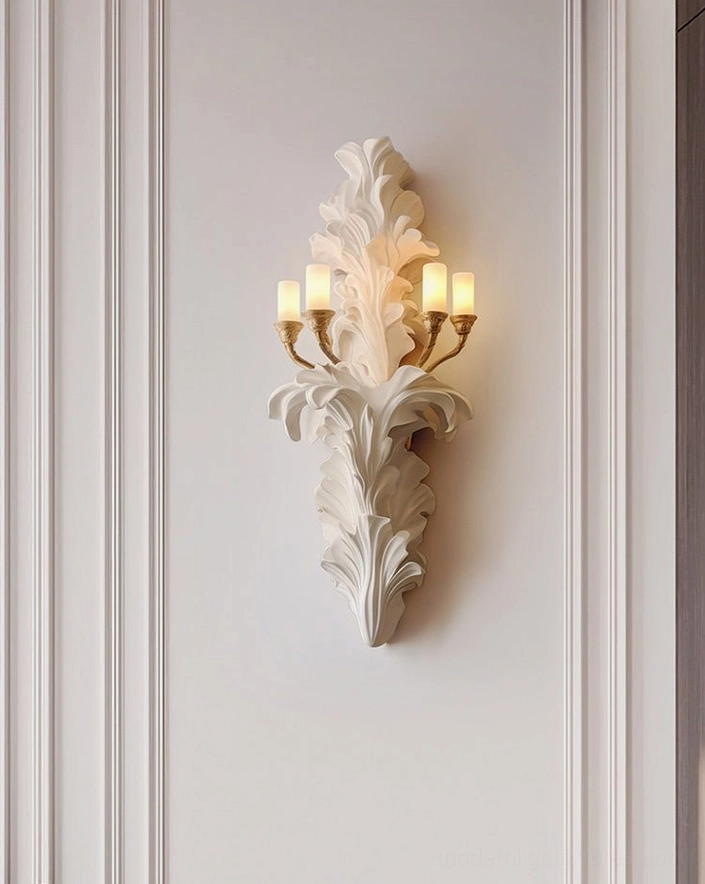 Celandra wall sconce showing brass lamp holders and candle-style socket configuration, four-light neoclassical botanical fixture close-up