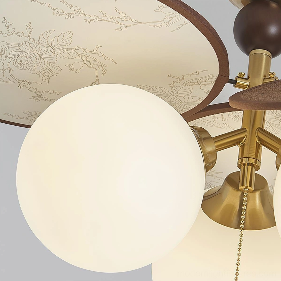 Celestial Spin mid-century modern ceiling lamp showing artistic blade design and lighting effect