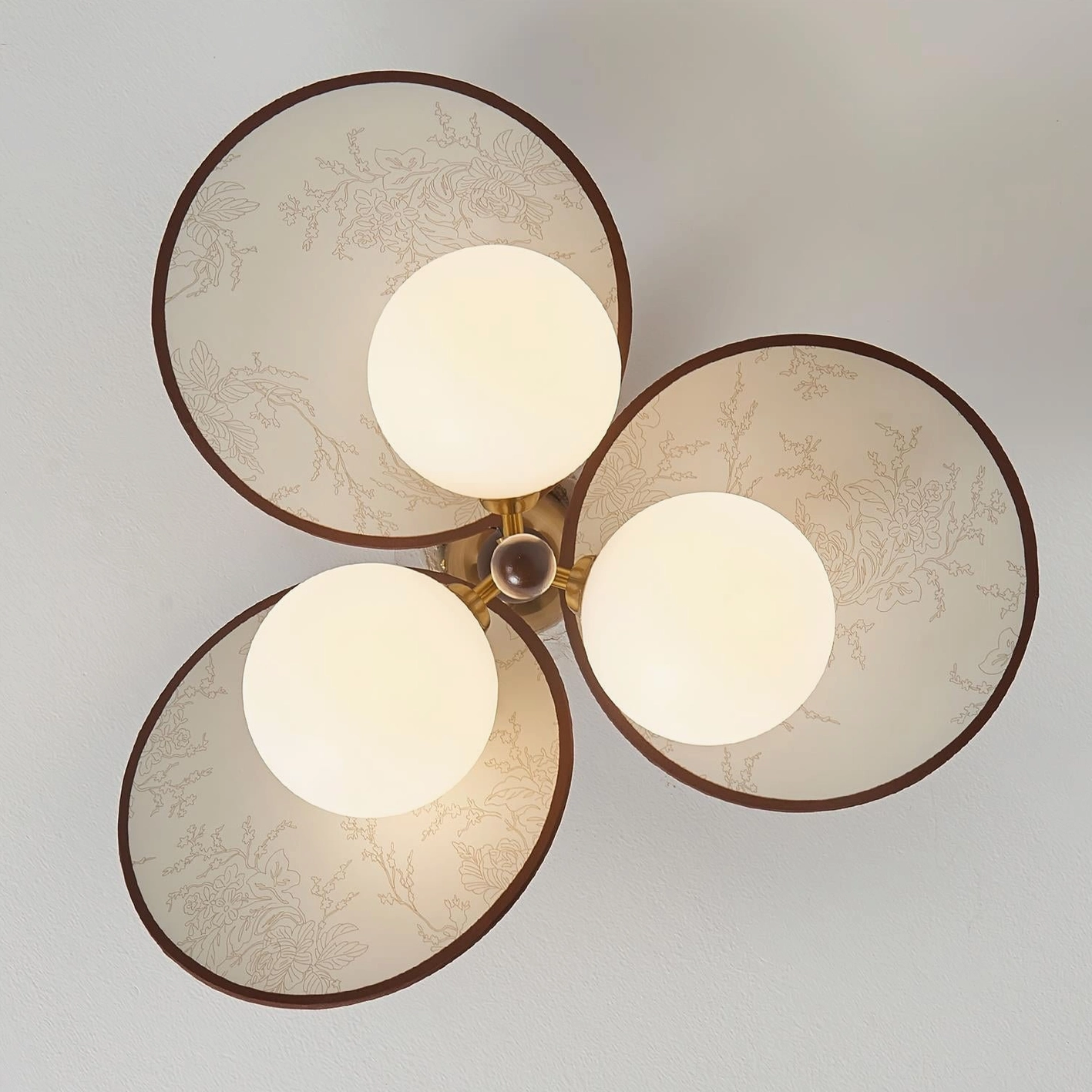 Ceiling light fixture Celestial Spin with drop pendant and wood blade design in modern home