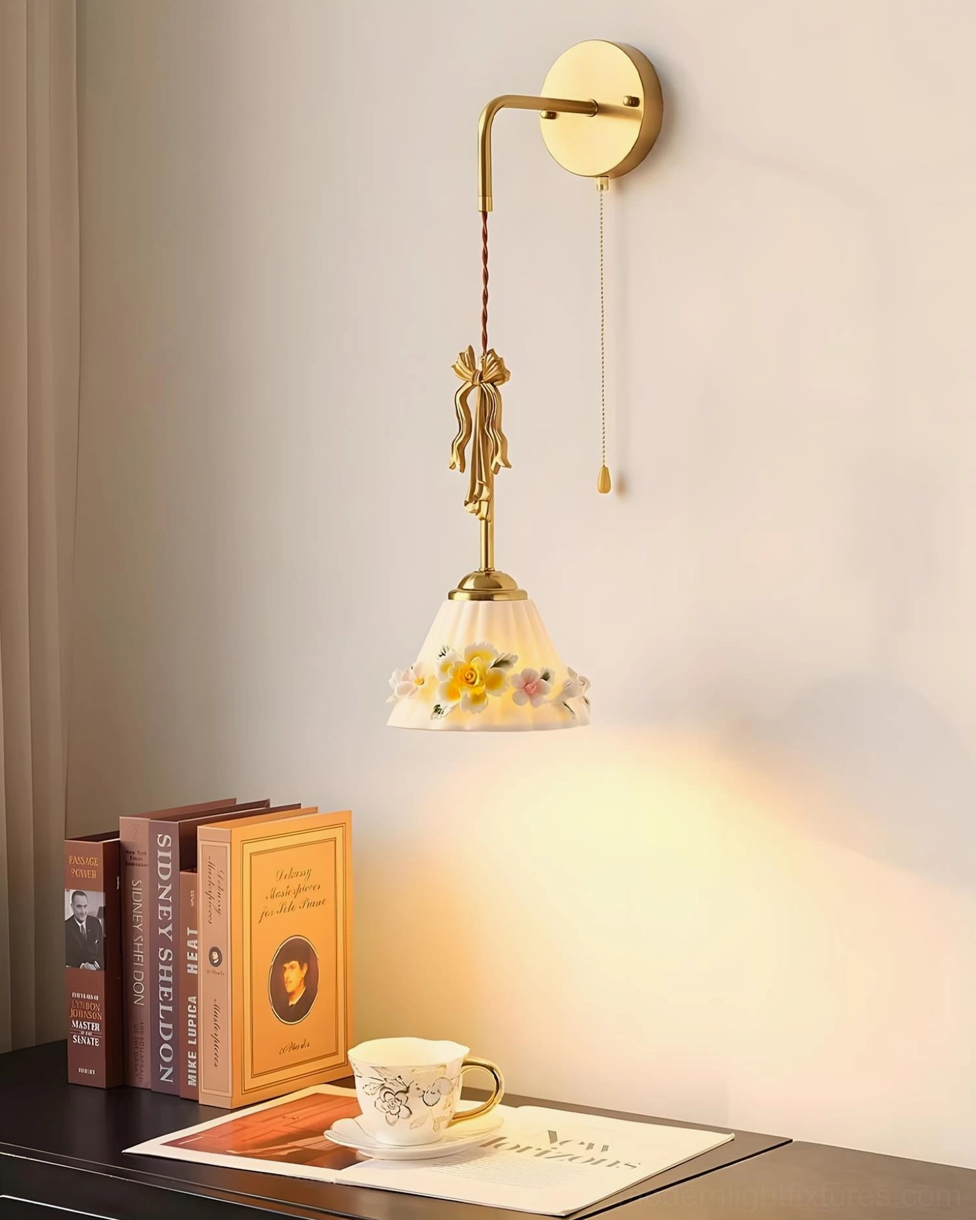 Celestine brass wall sconce with hand-painted floral ceramic shade and pull chain, side perspective view