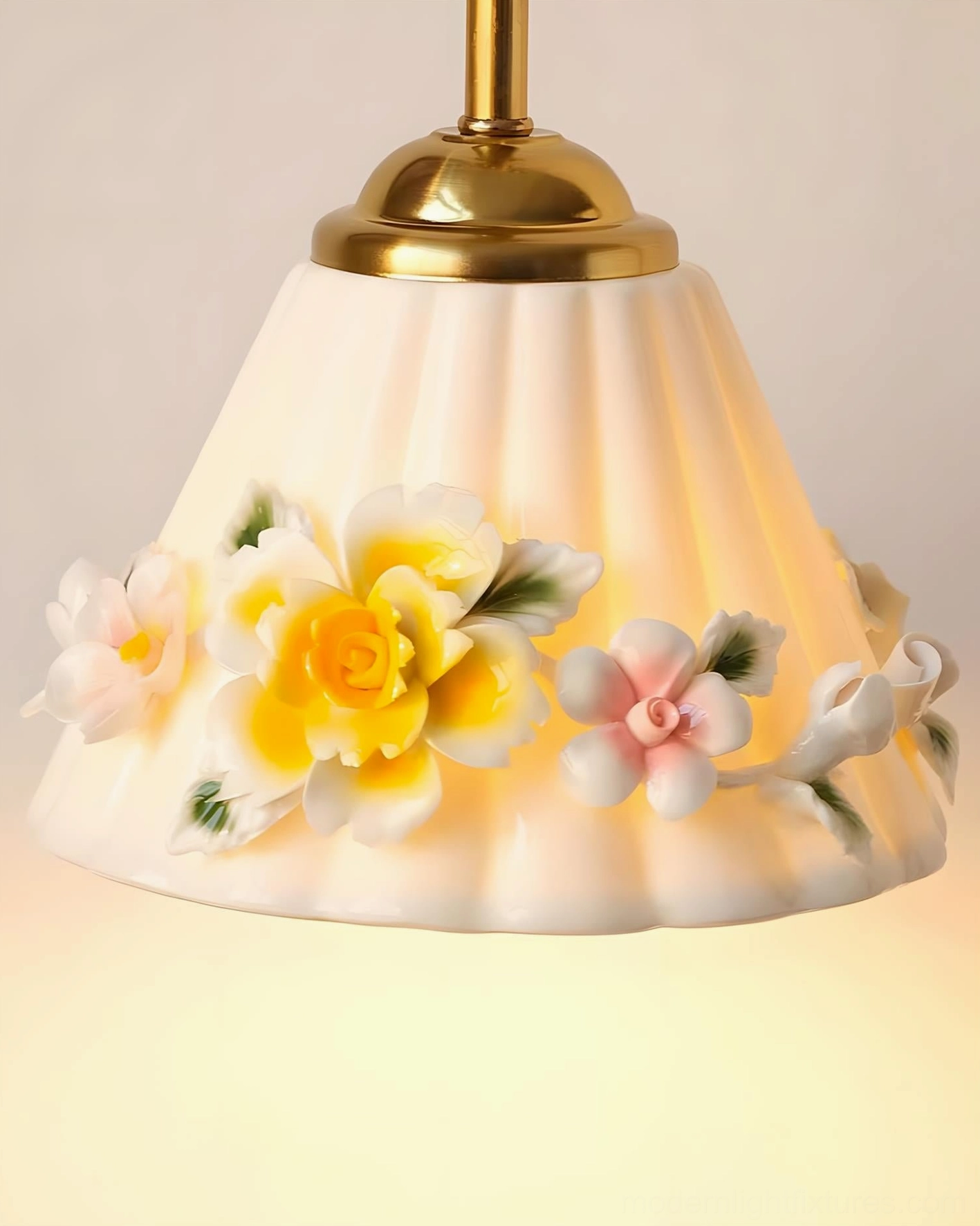 Celestine floral wall sconce with hand-sculpted ceramic shade showing botanical art details and craftsmanship