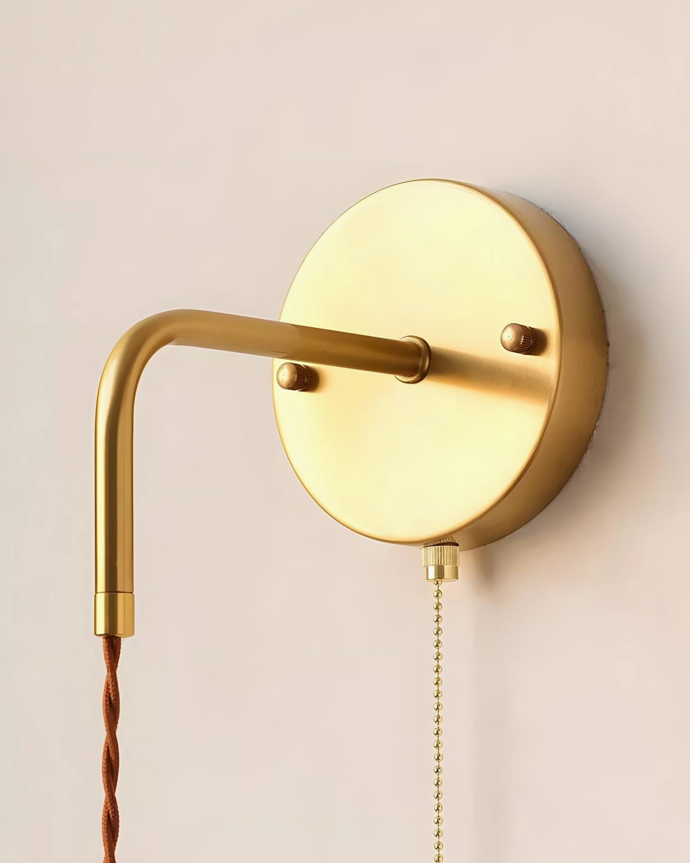 Celestine vintage wall sconce with floral ceramic shade and brass hardware in home interior wall arrangement