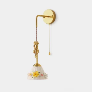 Celestine vintage wall sconce with hand-painted floral ceramic shade and brass gold finish, front studio view