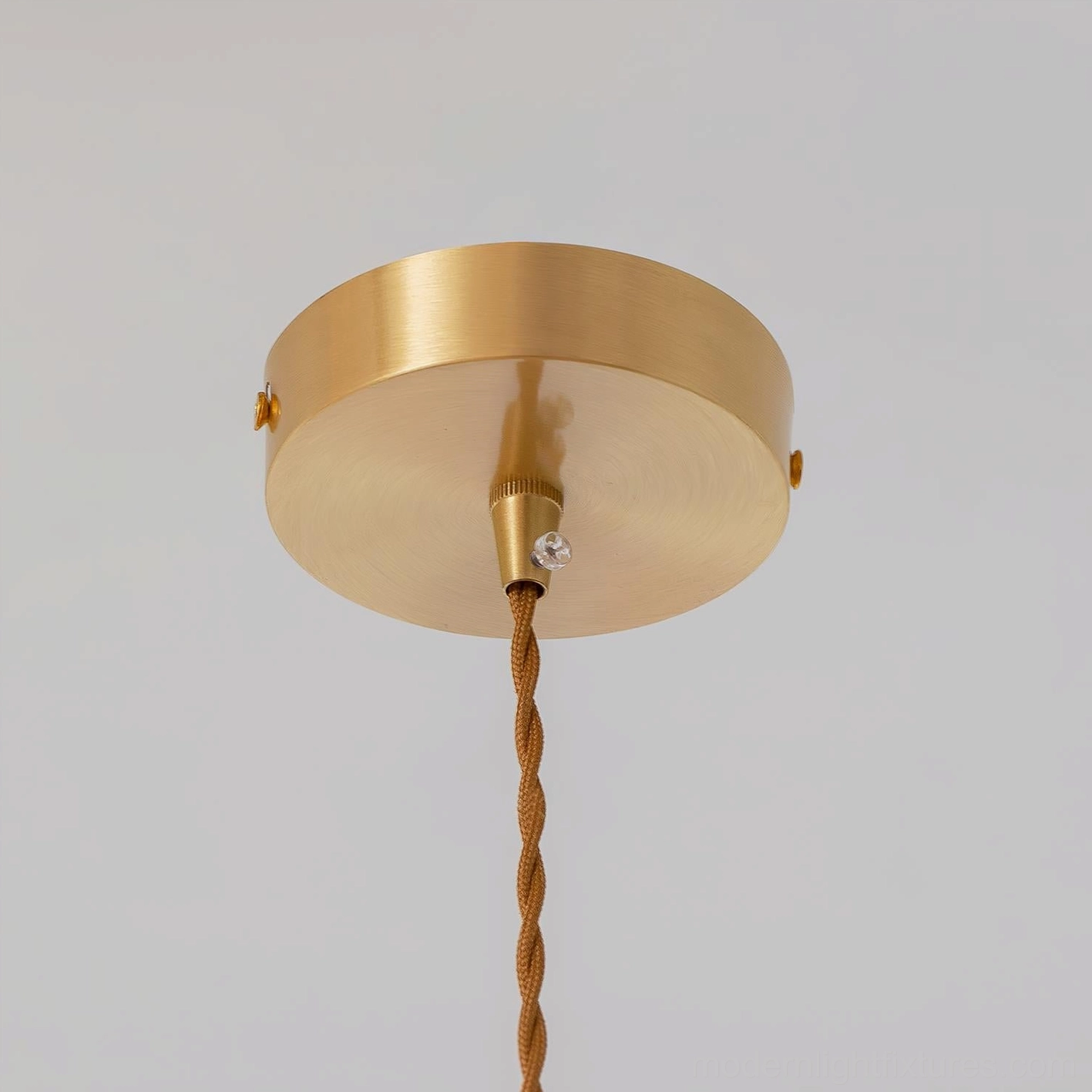 Celina pendant lamp ceiling canopy and brass hardware with twisted fabric cord detail showing professional installation component