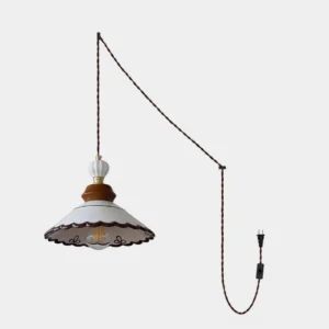 Celine hand-painted ceramic plug-in pendant light with scalloped shade, walnut neck, and braided cord displayed against white studio background