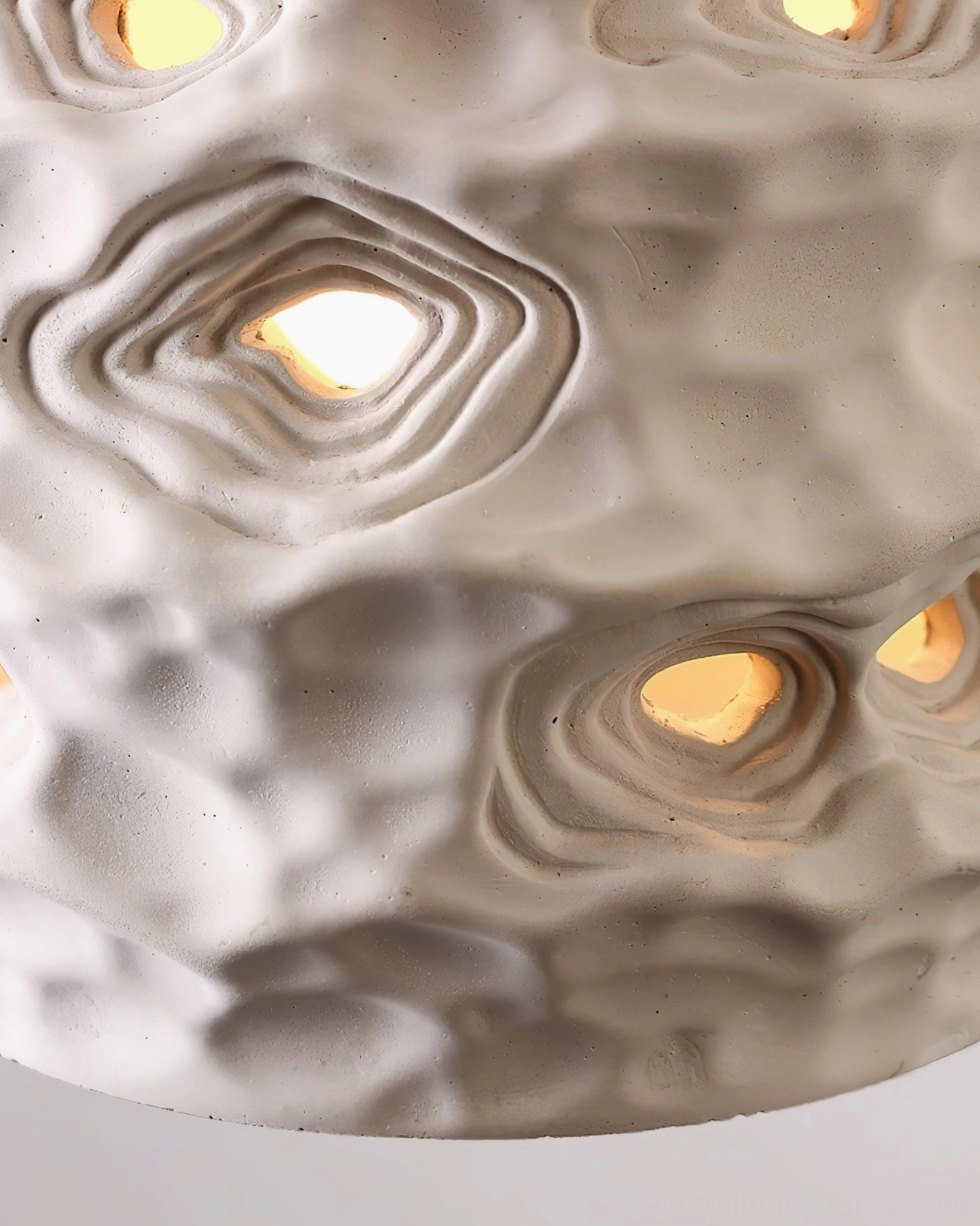 Ceramic pendant light featuring natural material construction with cement shade and authentic walnut wood detail