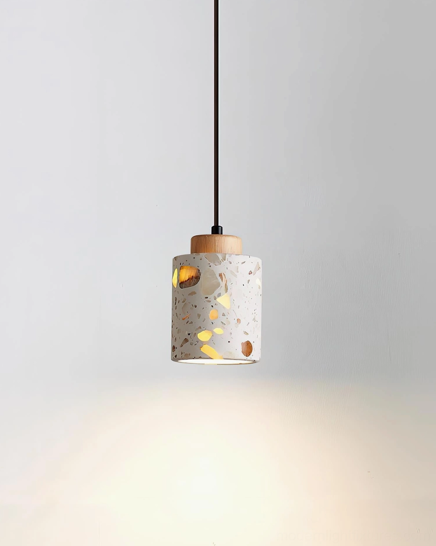 Textured terrazzo surface cemento pendant light diffusion material close-up view