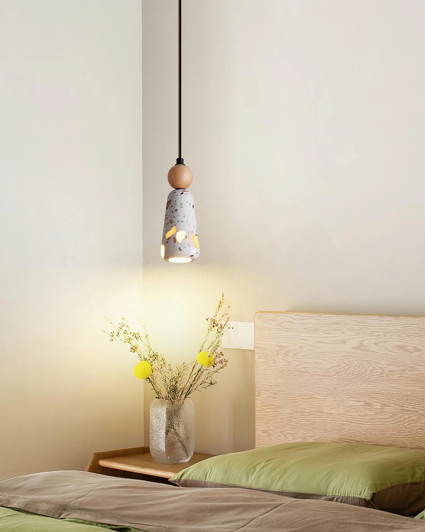 Terrazzo pendant lamp architectural detail closeup showing textured surface material