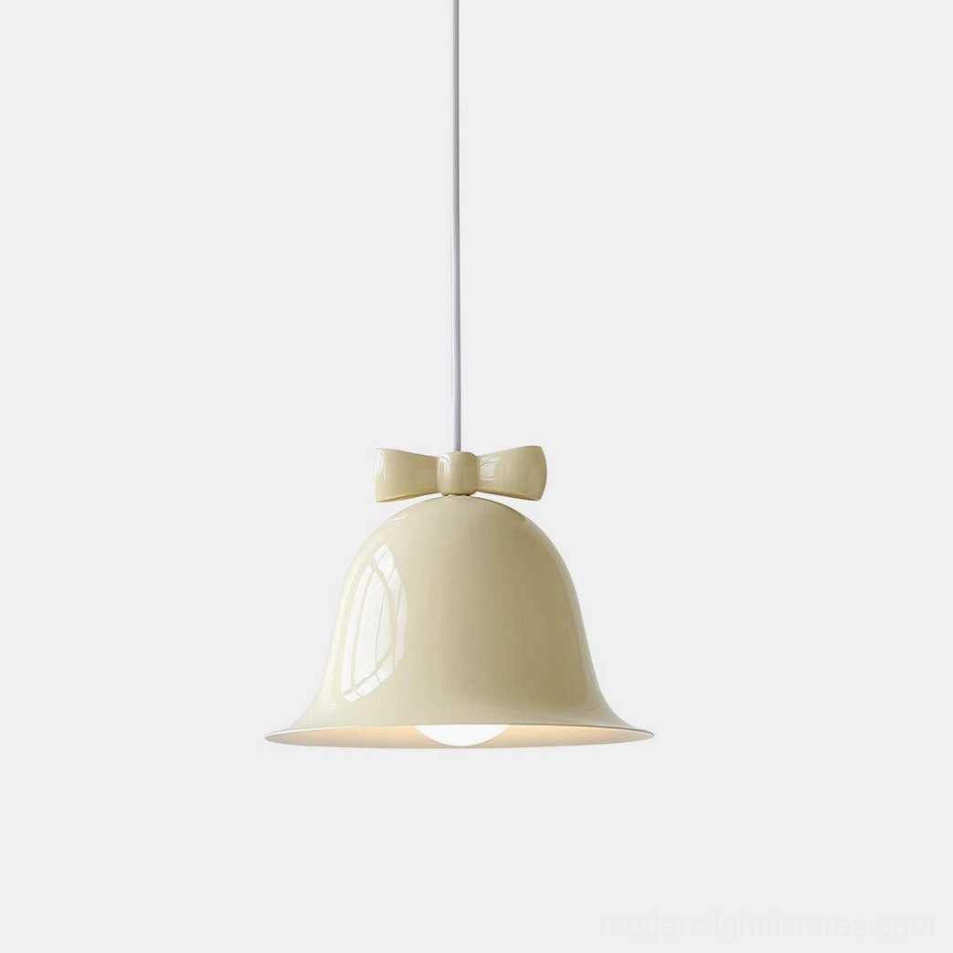 Cream ceramic bell-shaped pendant light with brown decorative bow, direct front view on white studio background