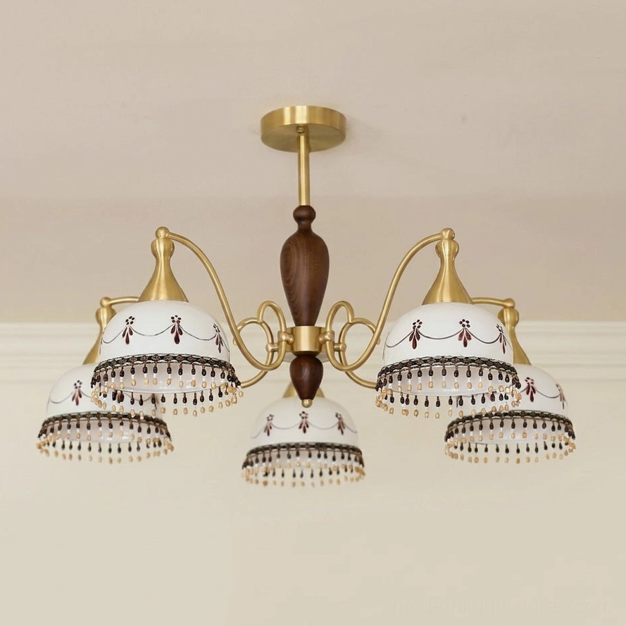 Hand-painted ceramic bell chandelier with beaded drops - overhead studio view