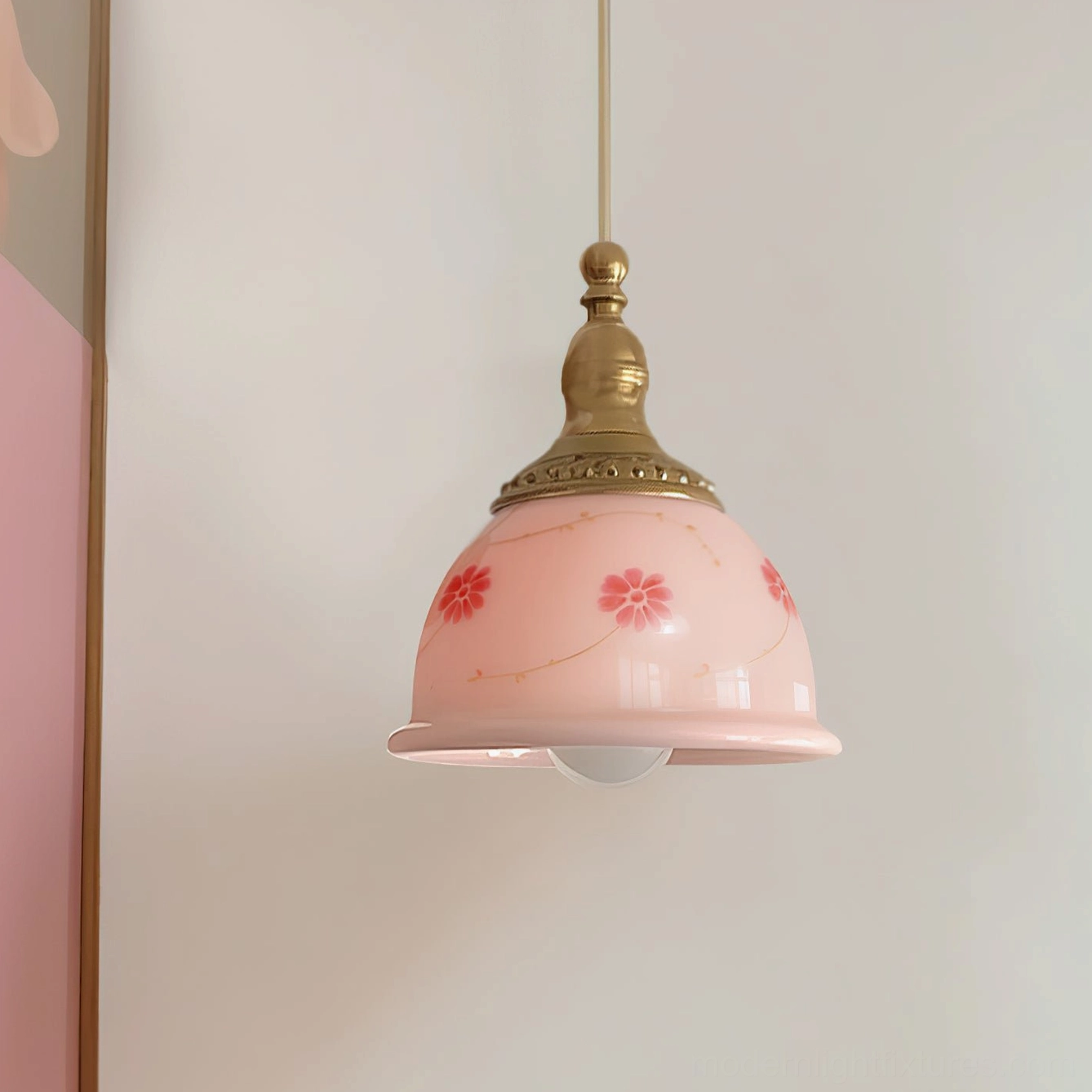 Ceramic floral pendant lamp side angle view showing intricate hand-painted red flower patterns on pink shade