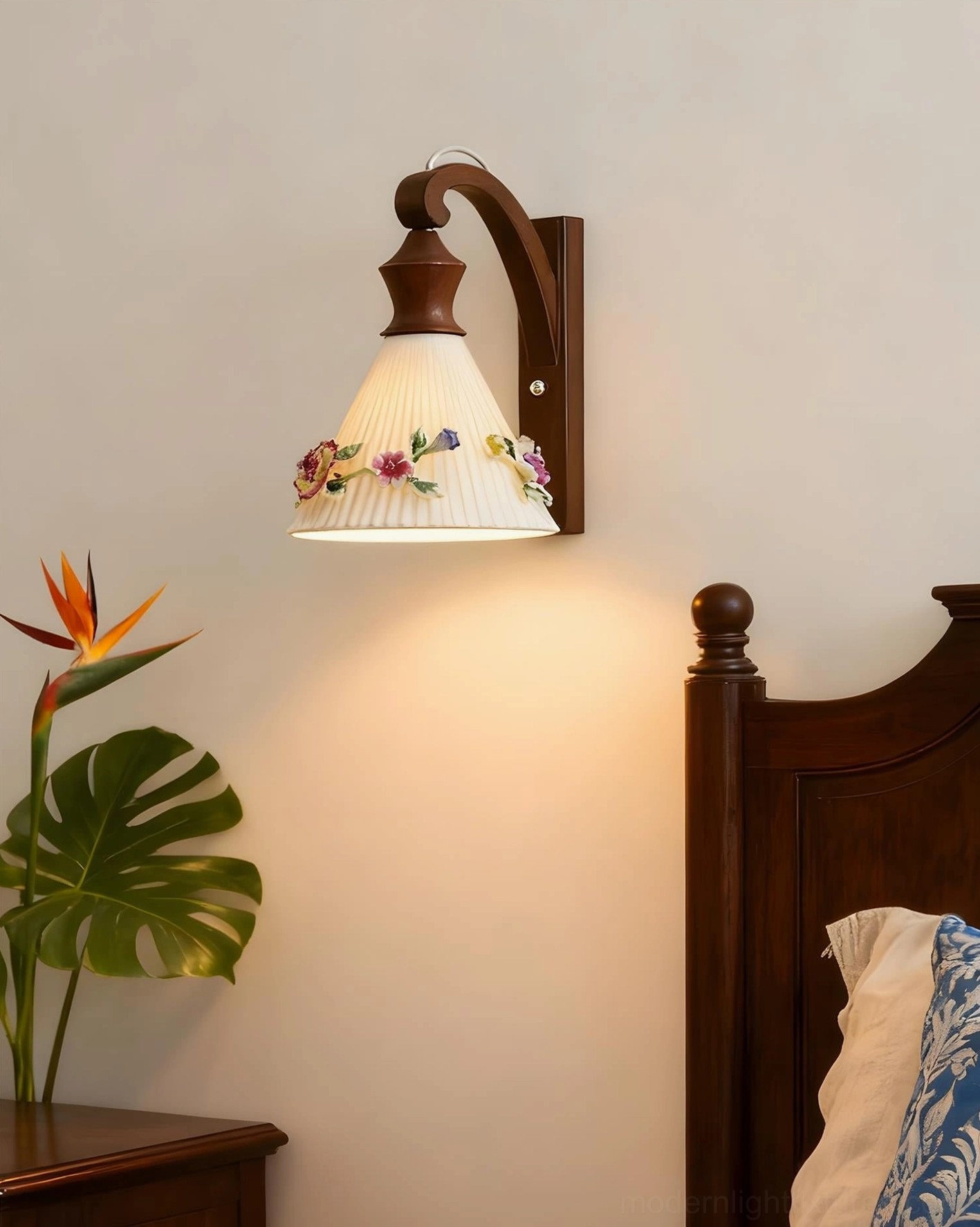 Vintage wall sconce lighting effect displaying soft ambient glow through ceramic floral shade