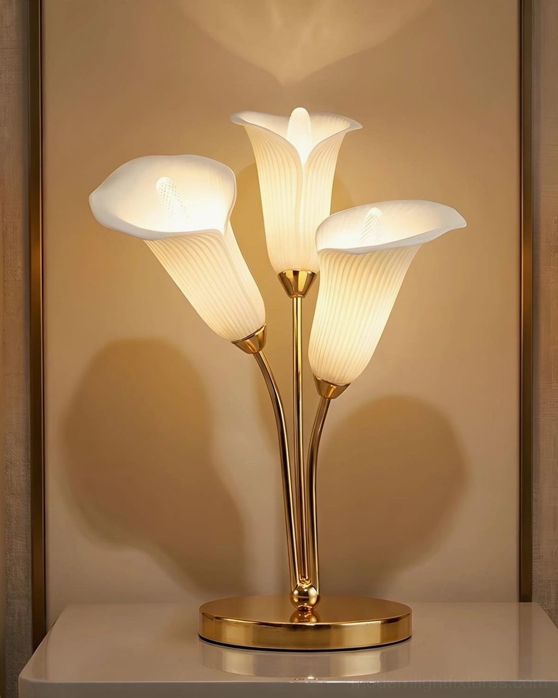 Sculptural ceramic table lamp in wall niche creating warm ambient accent lighting
