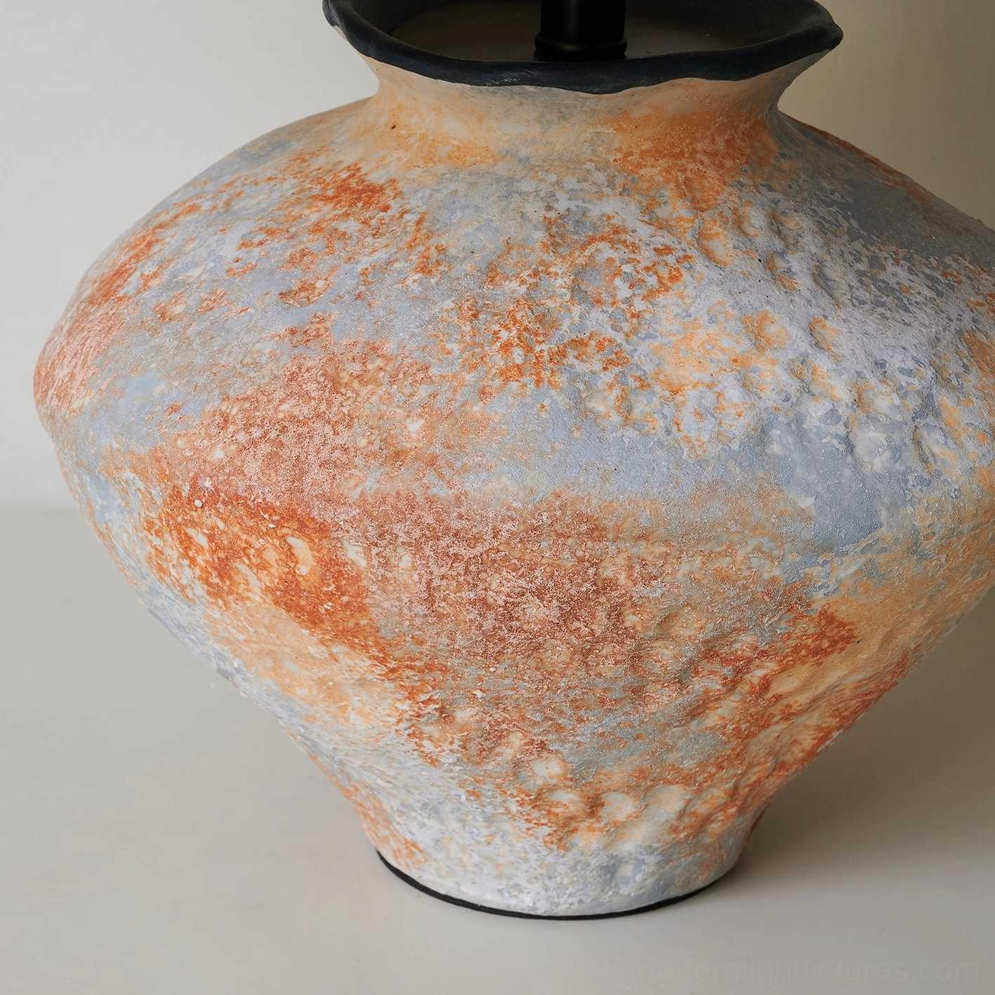 Ceramic table lamp and matching vase sculptural arrangement light background