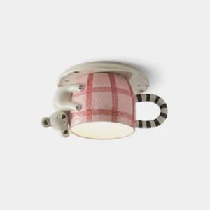 Whimsical ceramic koala gingham mug flush mount ceiling light with pink and white colors, close-up studio view
