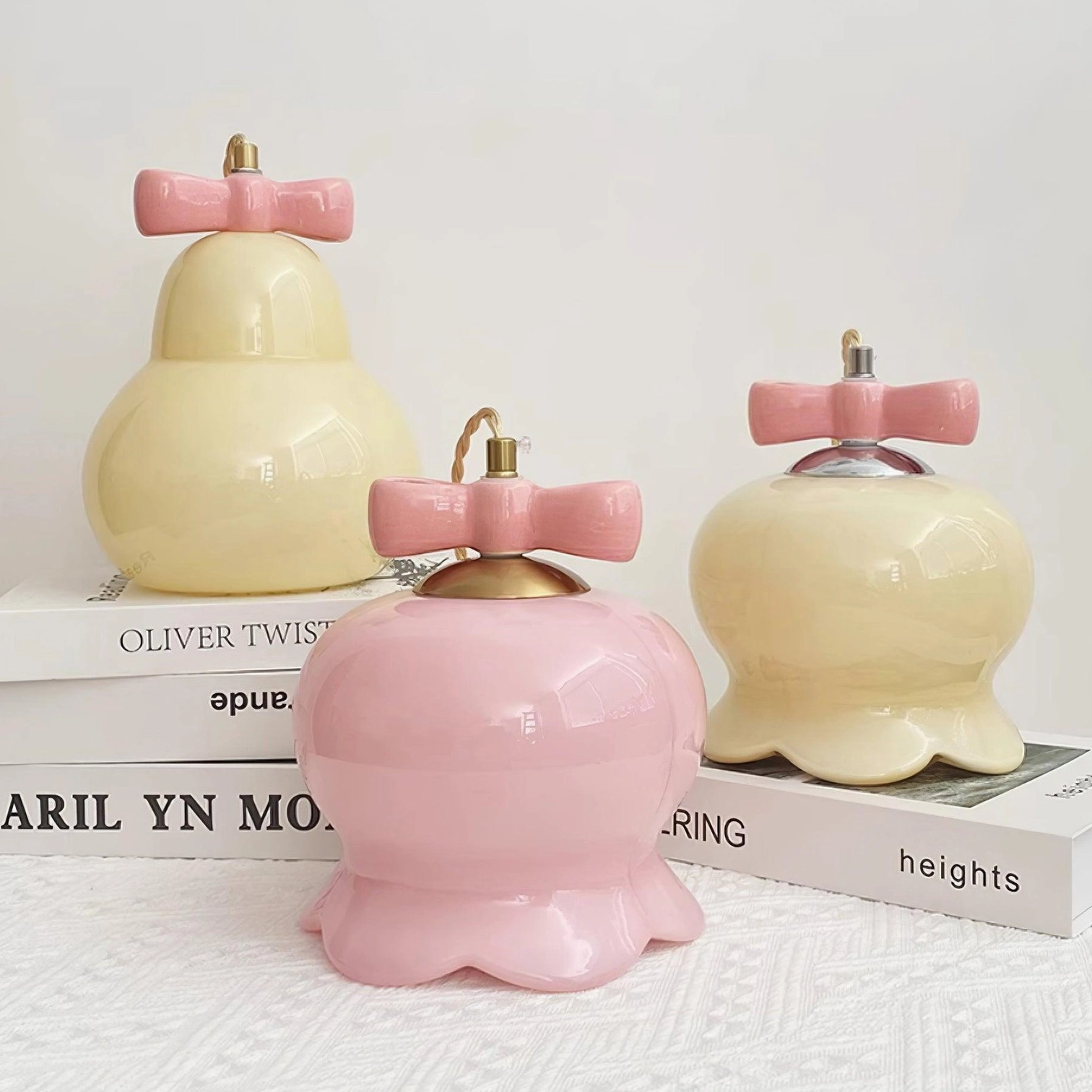 Ceramic pendant lamp with scalloped base and glossy finish displayed on bookshelf