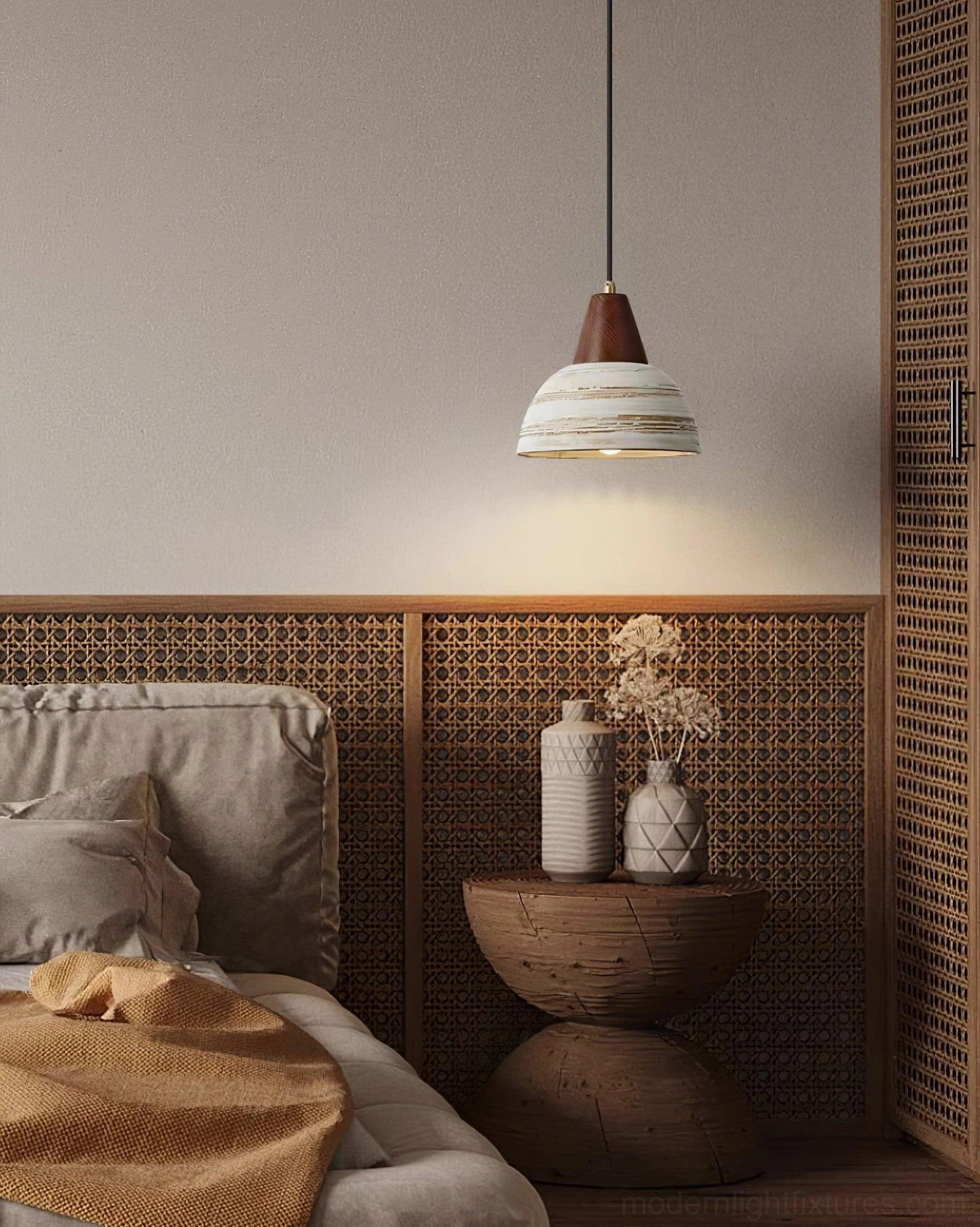 Handcrafted ceramic pendant light creating soft ambient lighting in dining or kitchen space
