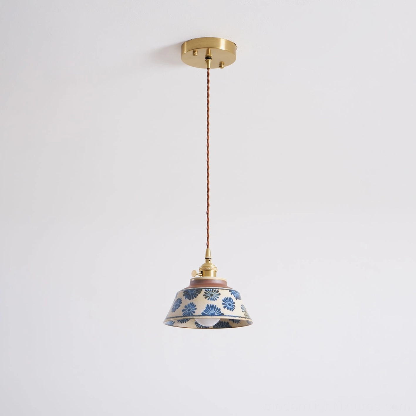Installation guide view showing ceramic pendant light canopy mounting and electrical connection