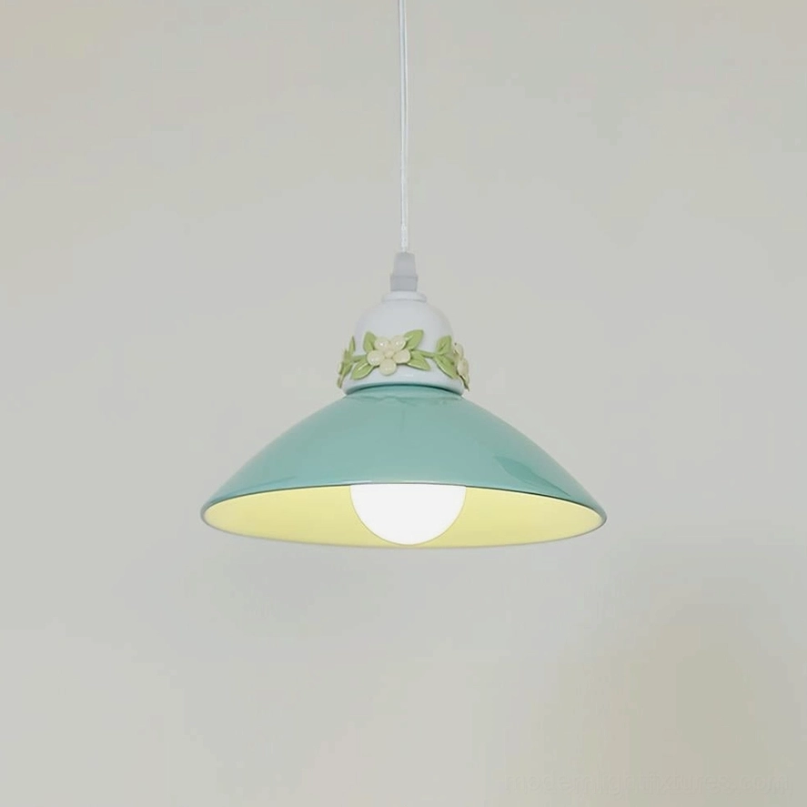 Close-up detail of hand-painted ceramic pendant light floral motifs, delicate green leaf design elements and botanical artistry