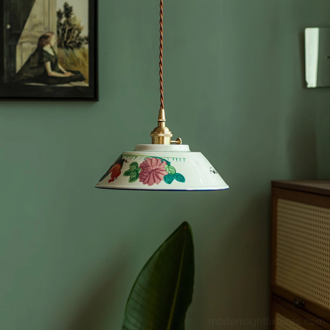 Close-up of ceramic pendant light's hand-painted details showing the floral artistry and glaze finish characteristic of teahouse aesthetic
