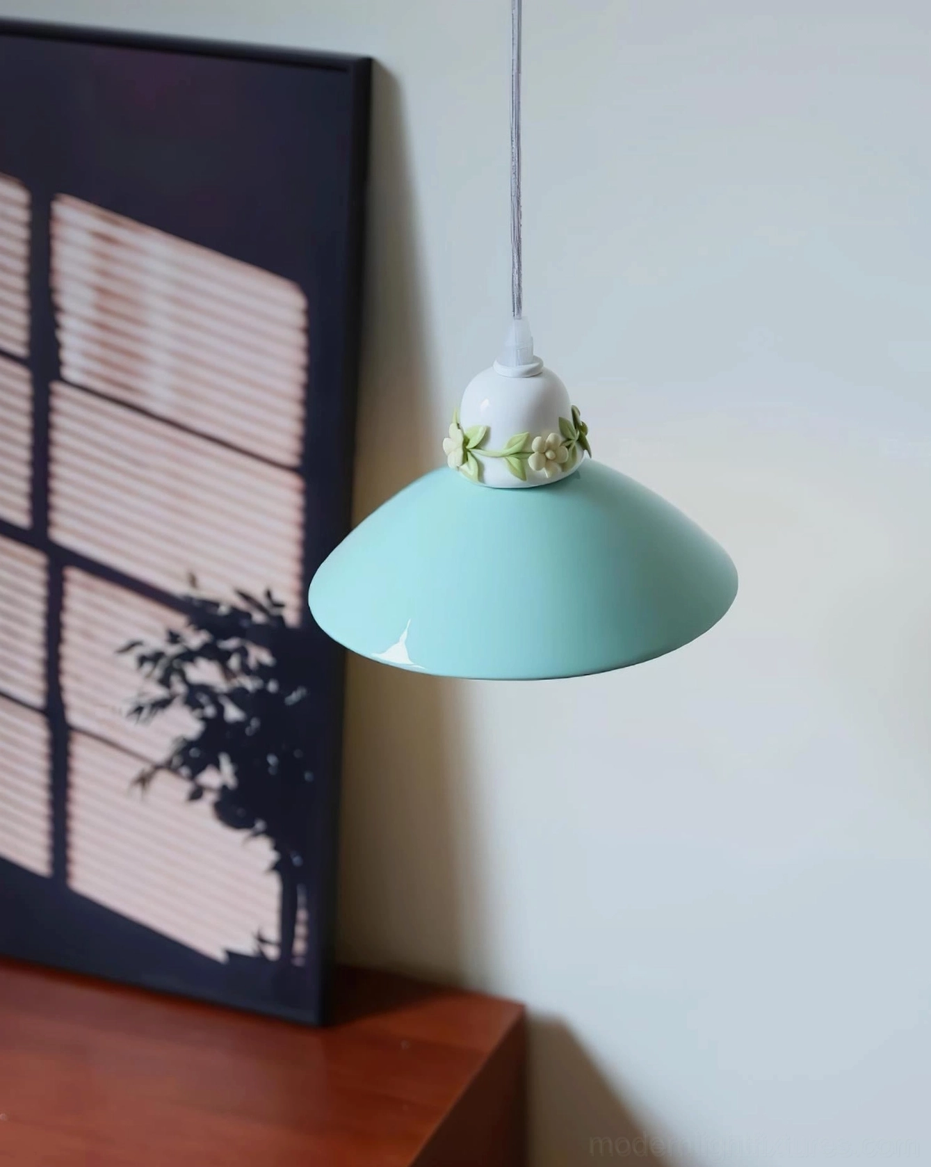 Hand-painted ceramic petal pendant light installation demonstration, hardwired fixture and mounting hardware assembly detail